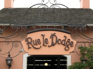 The ornate, Orleans-inspired entrance to the attraction in question.