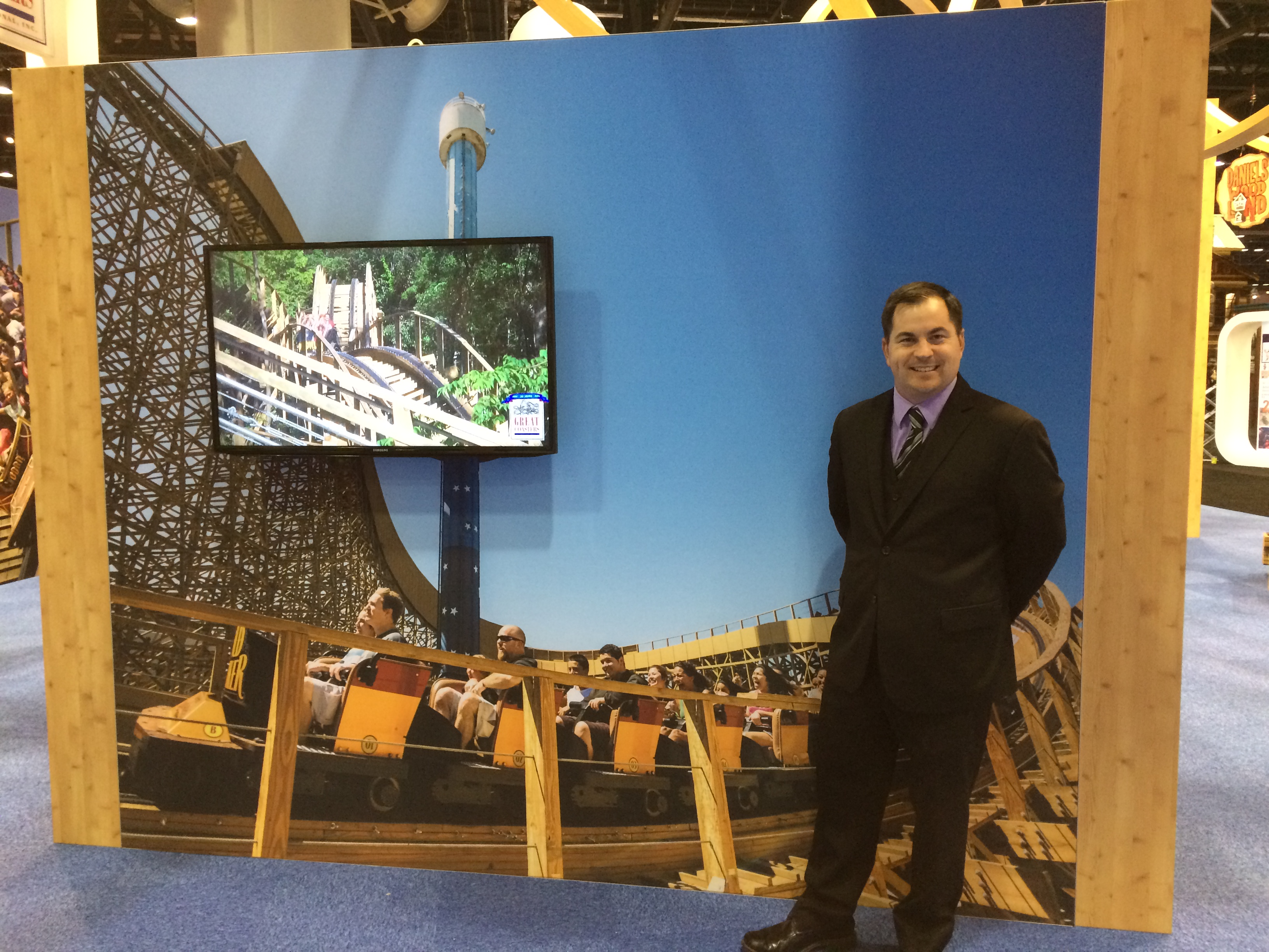 Standing next to one of my photos in the Great Coasters booth.